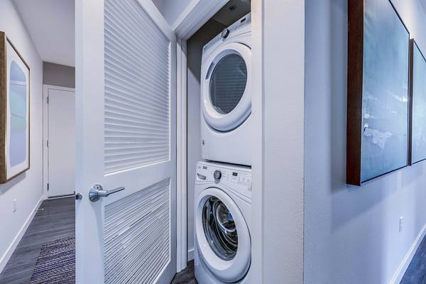 laundry room at Elan Uptown Flats Apartments