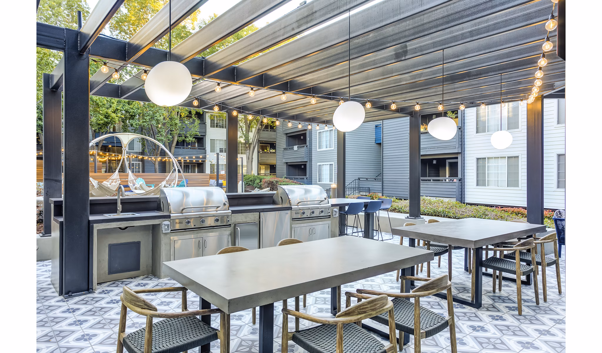 Outdoor grill area at Avana Sunnyvale Apartments offering communal cooking space for residents