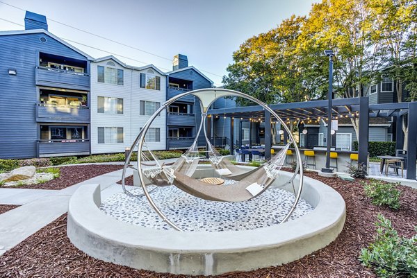 Hammocks in a serene outdoor space at Avana Sunnyvale Apartments