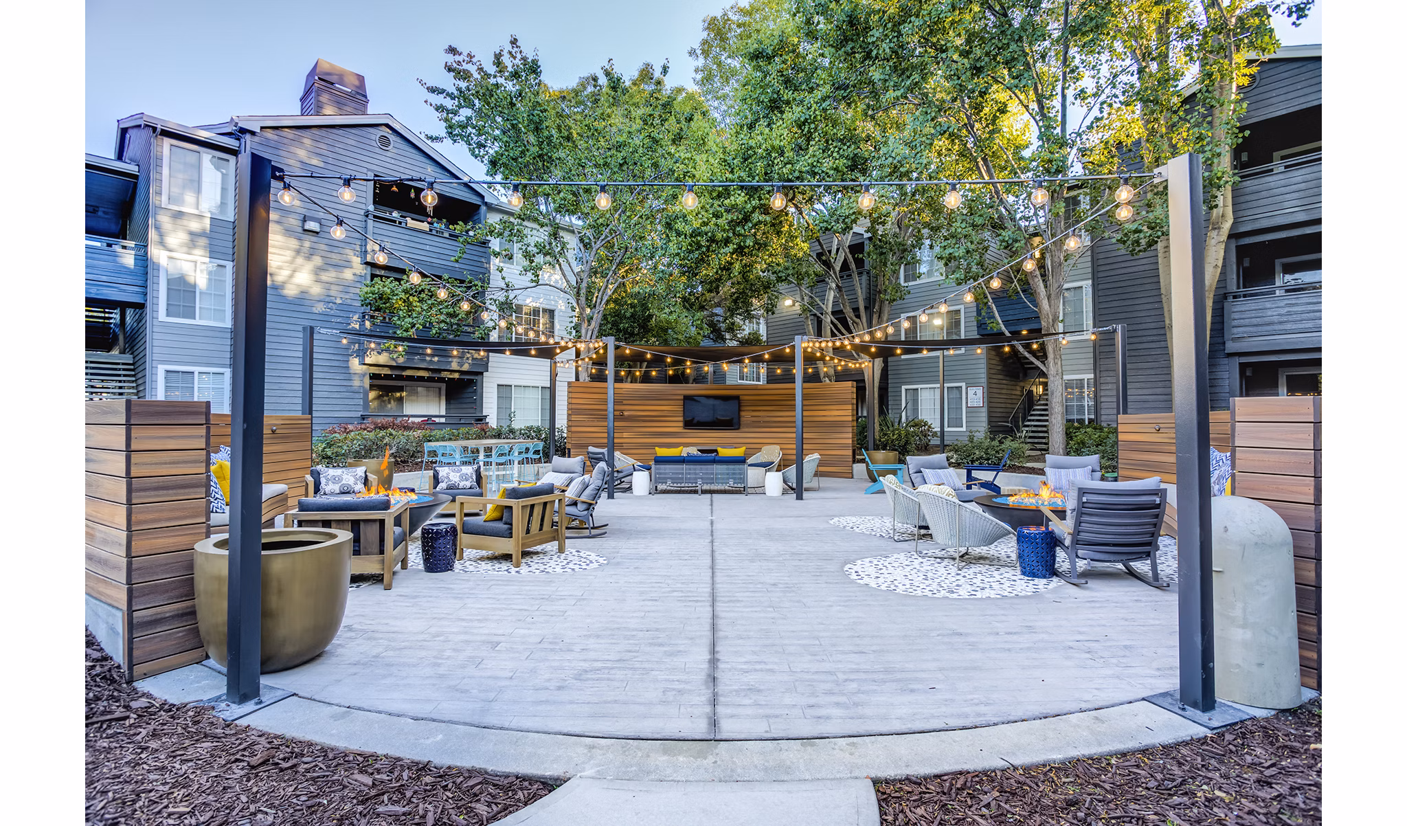 Outdoor fire pit and seating area at Avana Sunnyvale Apartments