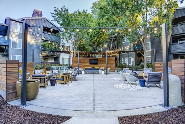 Outdoor fire pit and seating area at Avana Sunnyvale Apartments