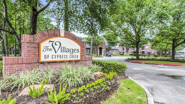 signage at The Villages of Cypress Creek Apartments