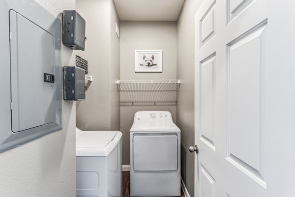 laundry room at The Villages of Cypress Creek Apartments