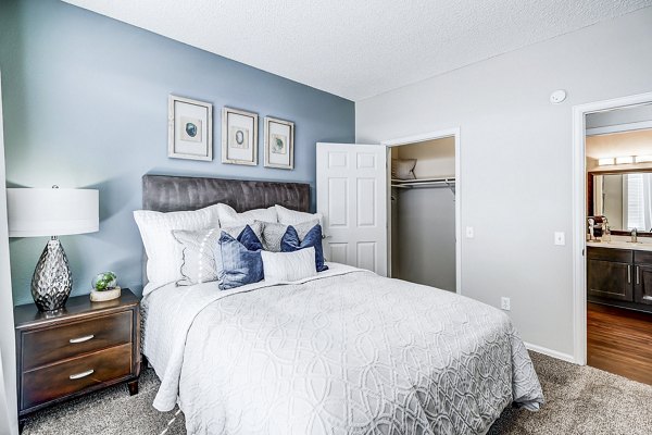 Spacious bedroom with modern decor at Commons at Briargate Apartments