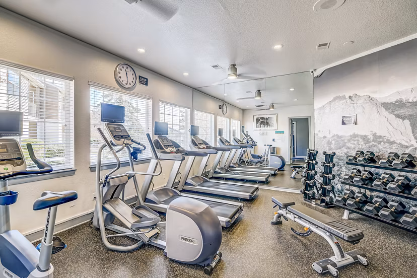 State-of-the-art fitness center featuring modern equipment at Commons at Briargate Apartments, offering luxury workout spaces