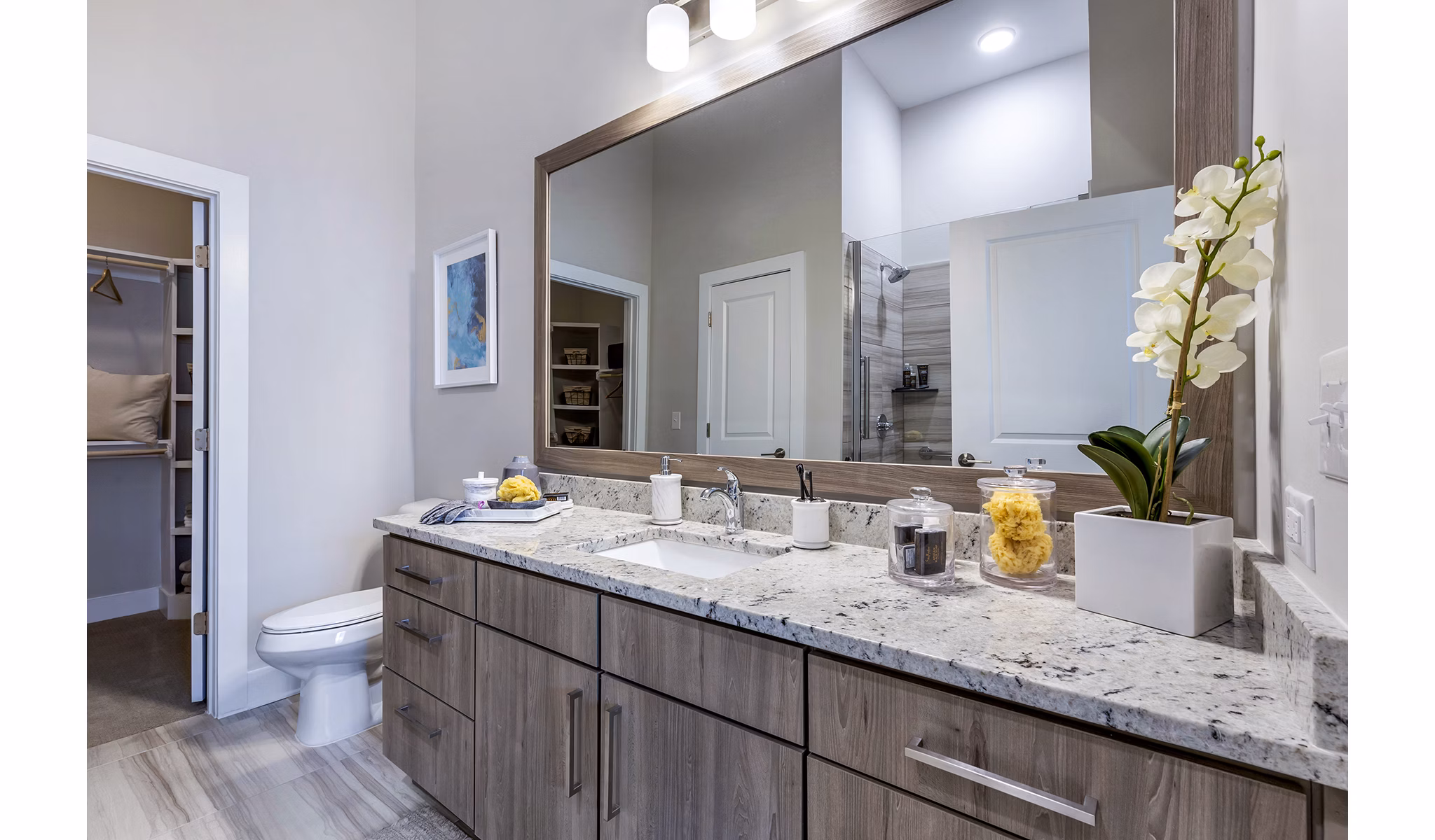Spacious bathroom with modern fixtures at Overture Providence Apartments, luxury living for adults seeking comfort and style