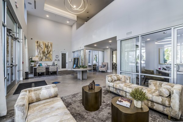 Stylish clubhouse lobby with modern seating at Overture Providence Apartments