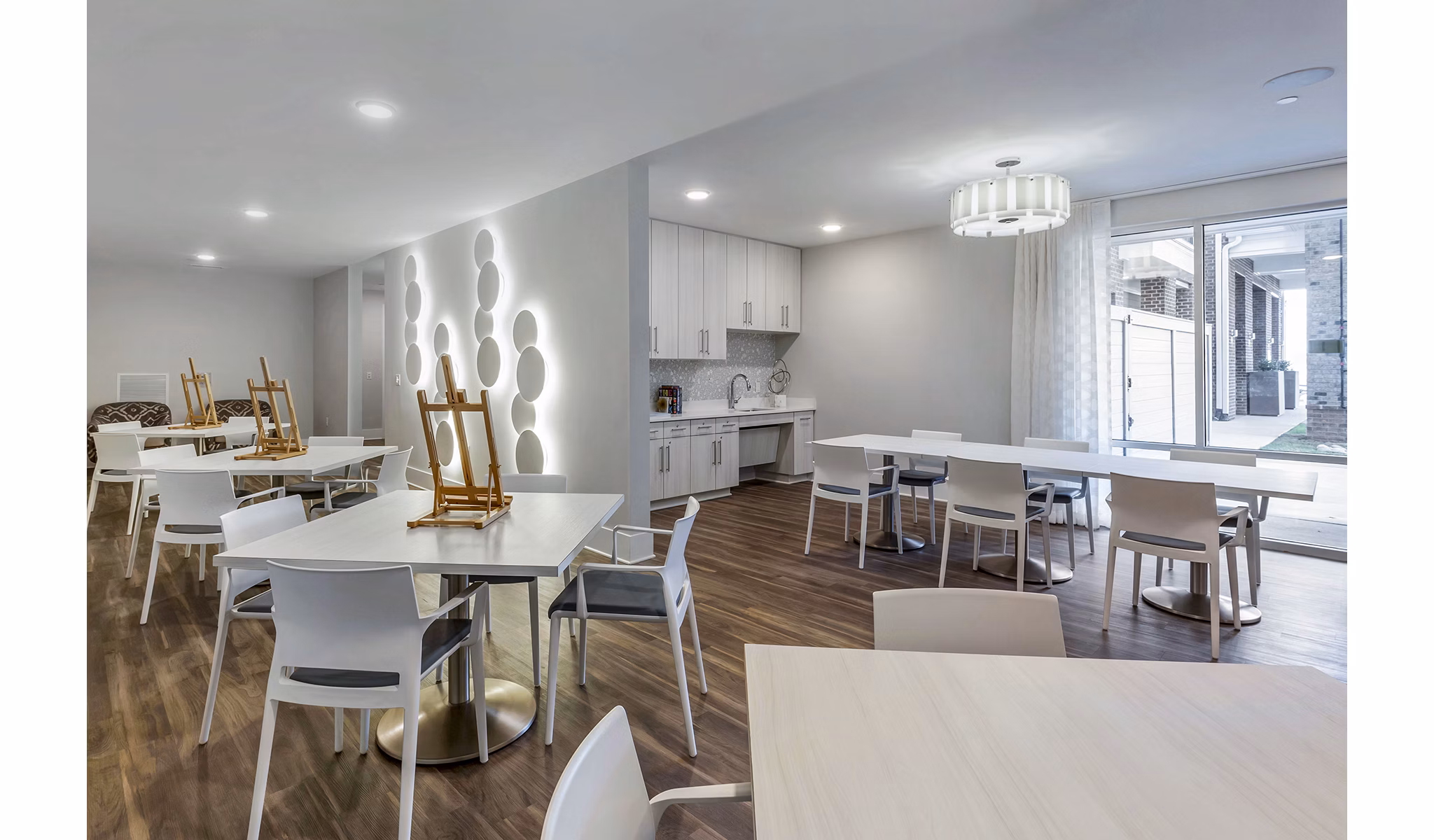 Artist studio featuring easels and canvases at Overture Providence Apartments luxury living community
