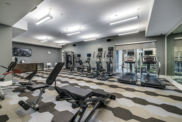 State-of-the-art fitness center with modern equipment at Overture Providence Apartments