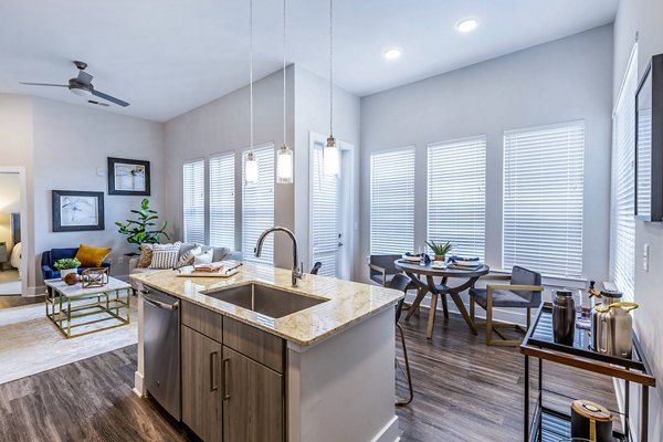 Modern kitchen with stainless steel appliances at Overture Providence Apartments, part of Greystar's luxury apartment offerings