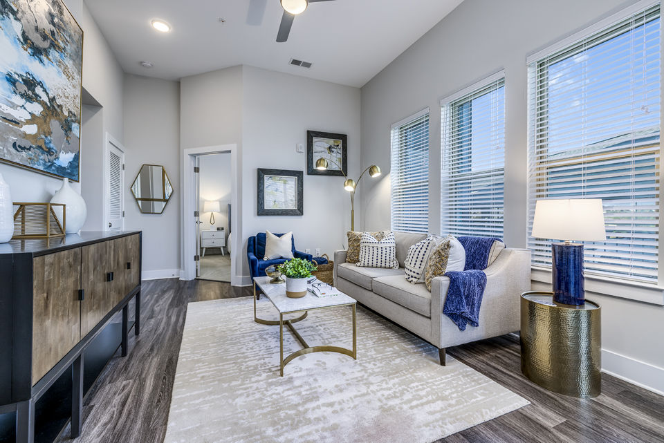 Spacious modern living room with sleek furnishings at Overture Providence Apartments in a luxurious setting