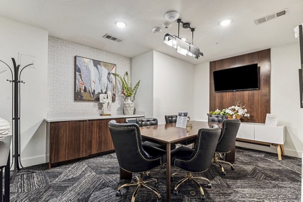 Spacious meeting facility with modern furnishings at Gallery at Turtle Creek Apartments, ideal for business gatherings and events