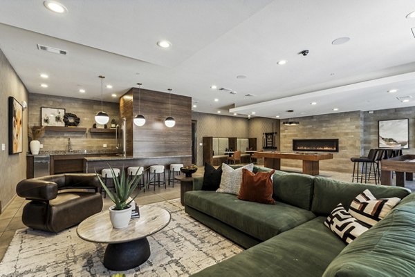 Clubhouse featuring modern lounge and entertainment areas at Gallery at Turtle Creek Apartments