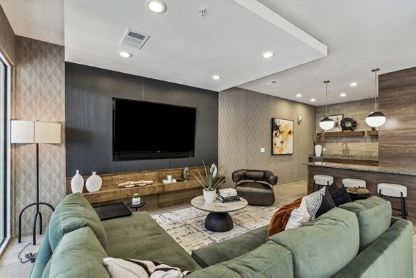 Clubhouse featuring modern design and cozy seating at Gallery at Turtle Creek Apartments, a luxury Greystar-managed property