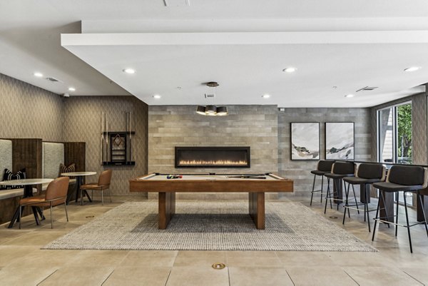 Clubhouse featuring elegant decor and modern furnishings at Gallery at Turtle Creek Apartments