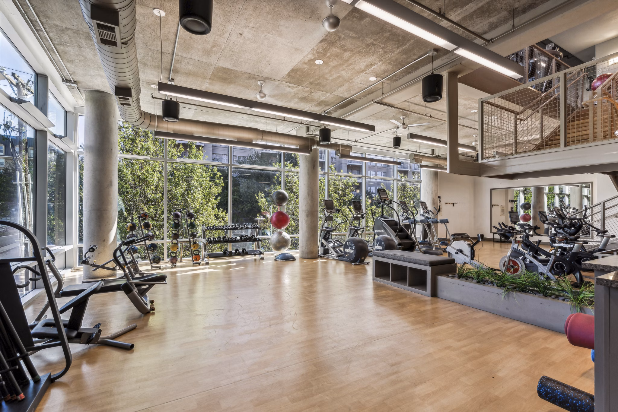 State-of-the-art fitness center with modern equipment at Gallery at Turtle Creek Apartments in Dallas