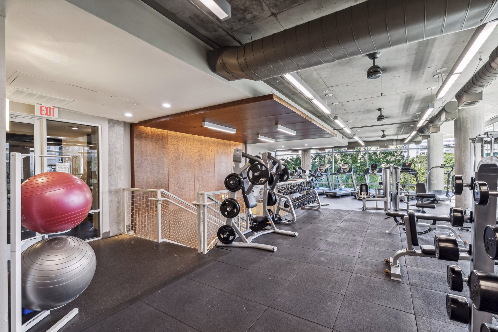 Fitness center with modern equipment at Gallery at Turtle Creek Apartments, a luxury community offering premium amenities for active lifestyles