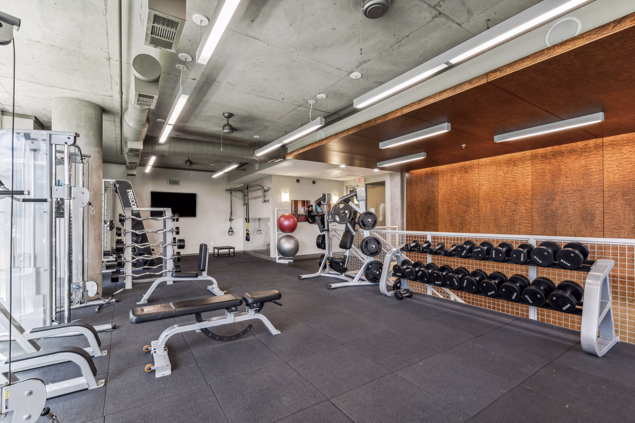 State-of-the-art fitness center with modern equipment at Gallery at Turtle Creek Apartments