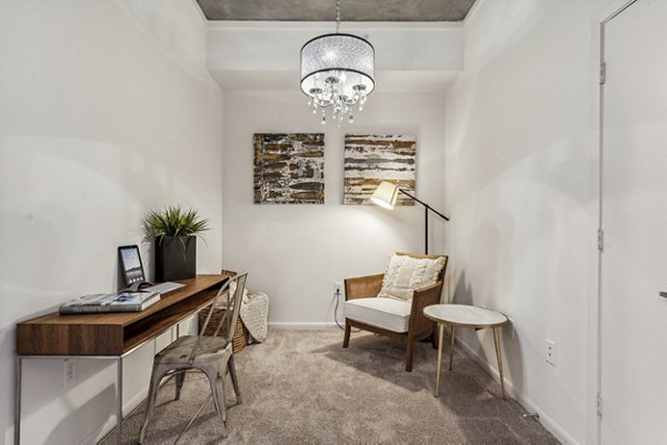 Home office with ergonomic furniture in Gallery at Turtle Creek Apartments