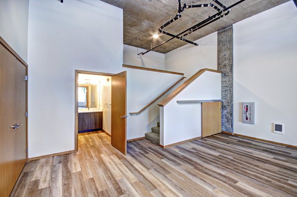 Modern living room with stylish decor at Aura West Seattle Apartments