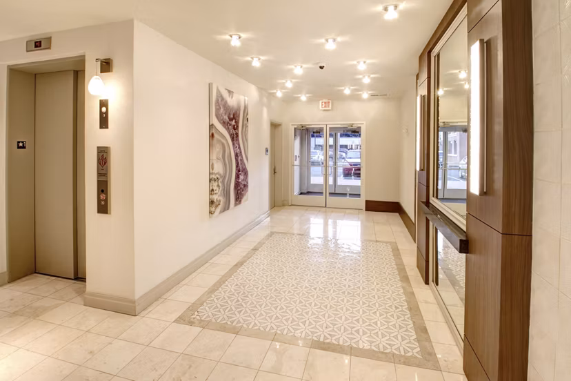 Elegant clubhouse with modern decor at The Harper at Harmon Meadow Apartments
