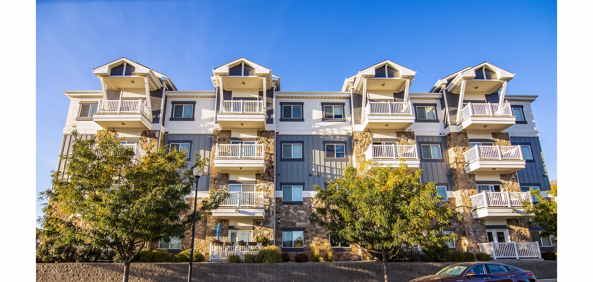 Cottages on 7th: Charming cottage-style homes in 55+ community with lush landscaping