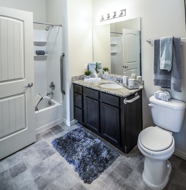 Modern bathroom with sleek finishes at Cottages on 7th, a 55+ Community Apartments
