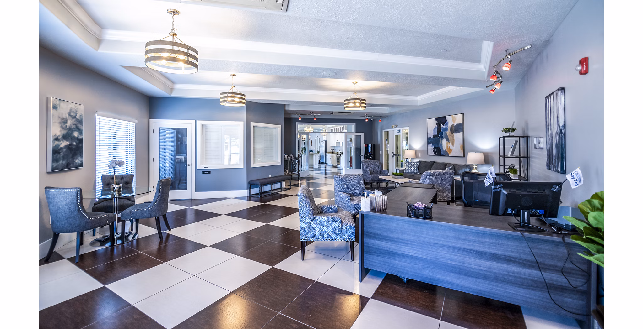 Elegant clubhouse with cozy seating and modern decor at Cottages on 7th, a 55+ community