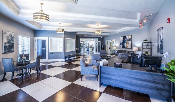 Elegant clubhouse with cozy seating and modern decor at Cottages on 7th, a 55+ community