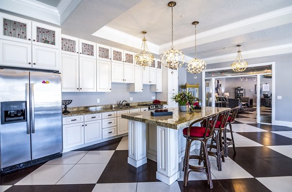 Expansive clubhouse with cozy seating at Cottages on 7th, a 55+ community offering luxury amenities for active seniors