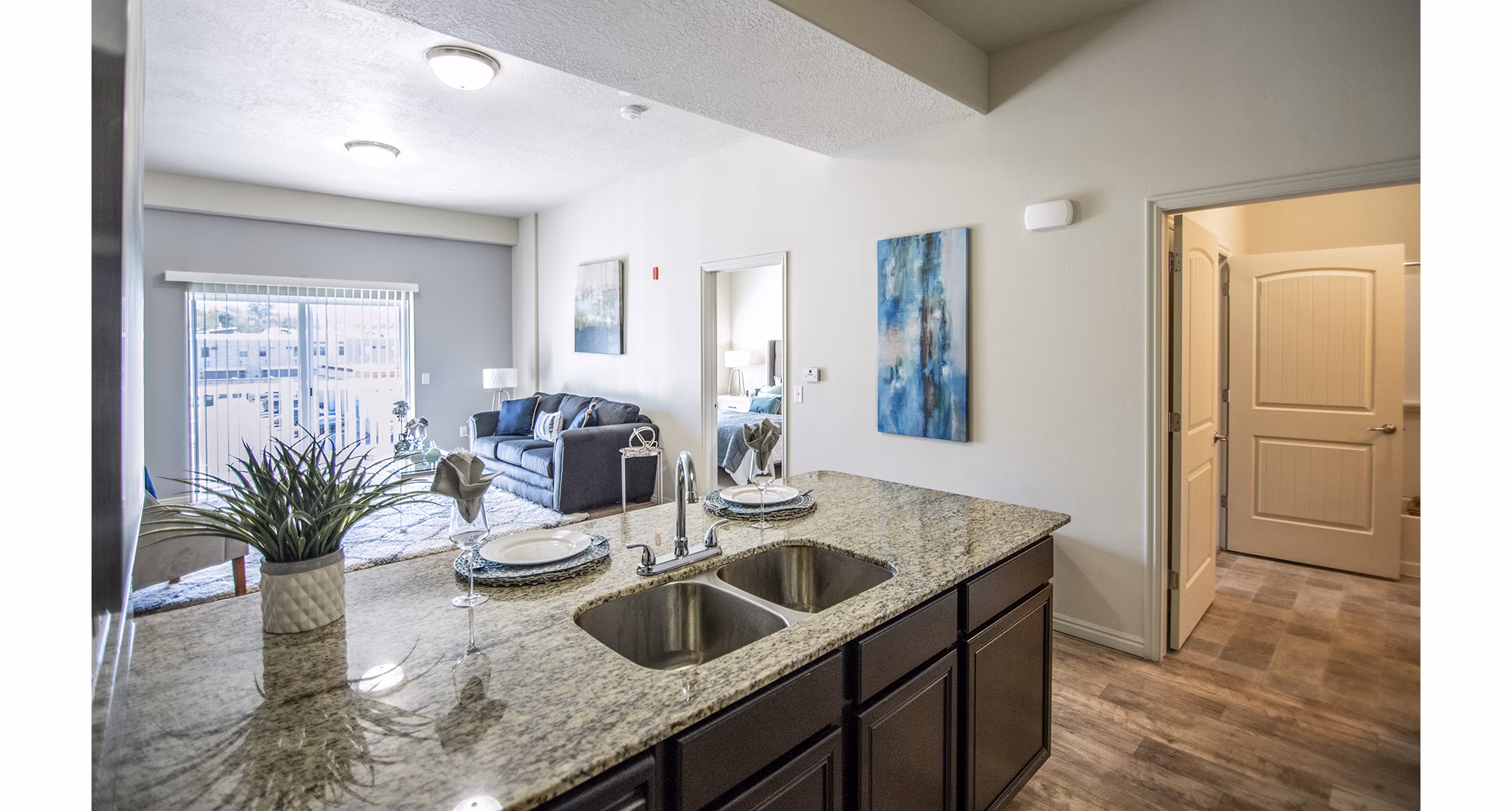Spacious kitchen with stainless steel appliances at Cottages on 7th, a 55+ Community Apartments