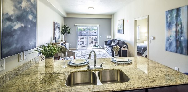 Dining room featuring elegant dining set at Cottages on 7th, a luxury 55+ community