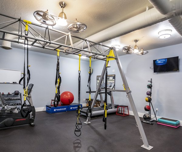 Modern fitness center featuring state-of-the-art equipment at Cottages on 7th, a 55+ community apartments