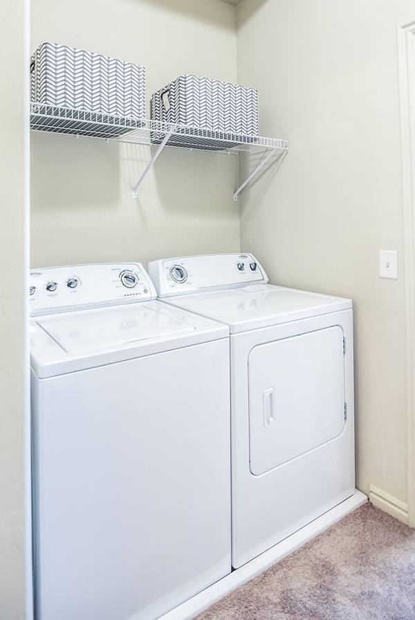 laundry room at Cottages on 7th a 55+ Community Apartments