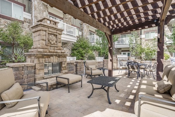 Outdoor recreational area at Cottages on 7th, a 55+ community featuring gardens and walking paths