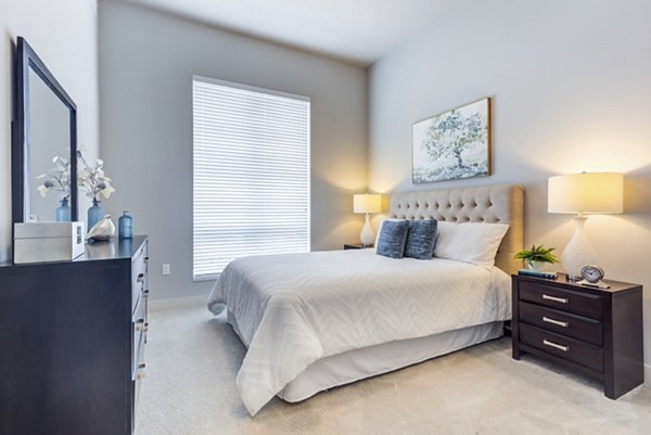 Spacious bedroom with modern decor at Overture Yorktown Apartments for luxury living