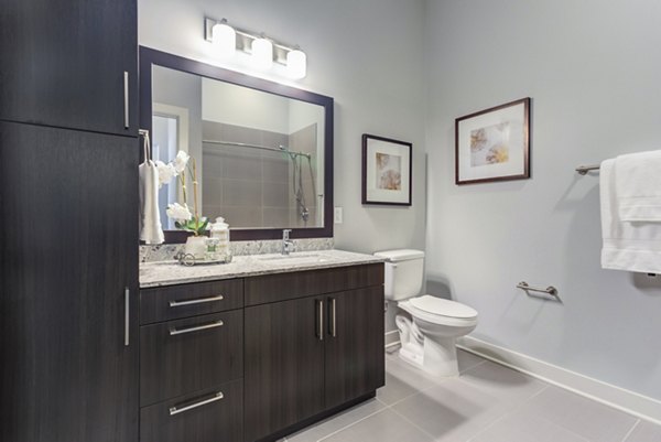 Modern bathroom with sleek fixtures at Overture Yorktown Apartments