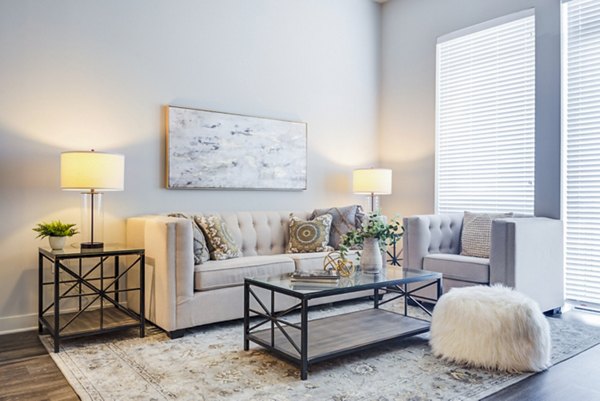 Elegant living room with modern design features at Overture Yorktown Apartments
