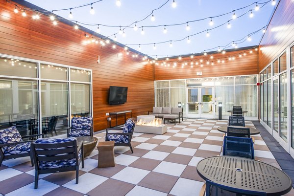 fire pit and seating area patio at Overture Yorktown Apartments