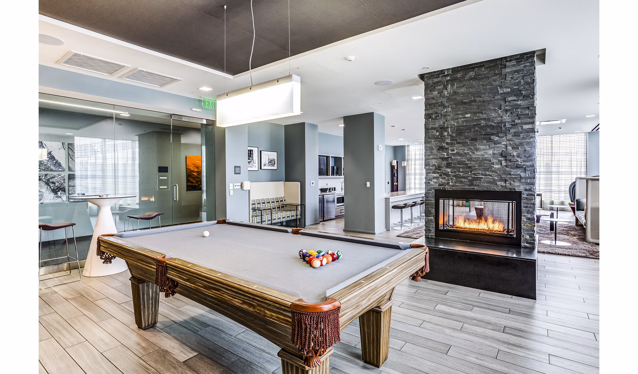 Modern clubhouse and lobby with stylish seating at Zinc Apartments, offering luxury living spaces in a vibrant community environment