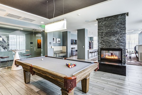 Modern clubhouse and lobby with stylish seating at Zinc Apartments, offering luxury living spaces in a vibrant community environment