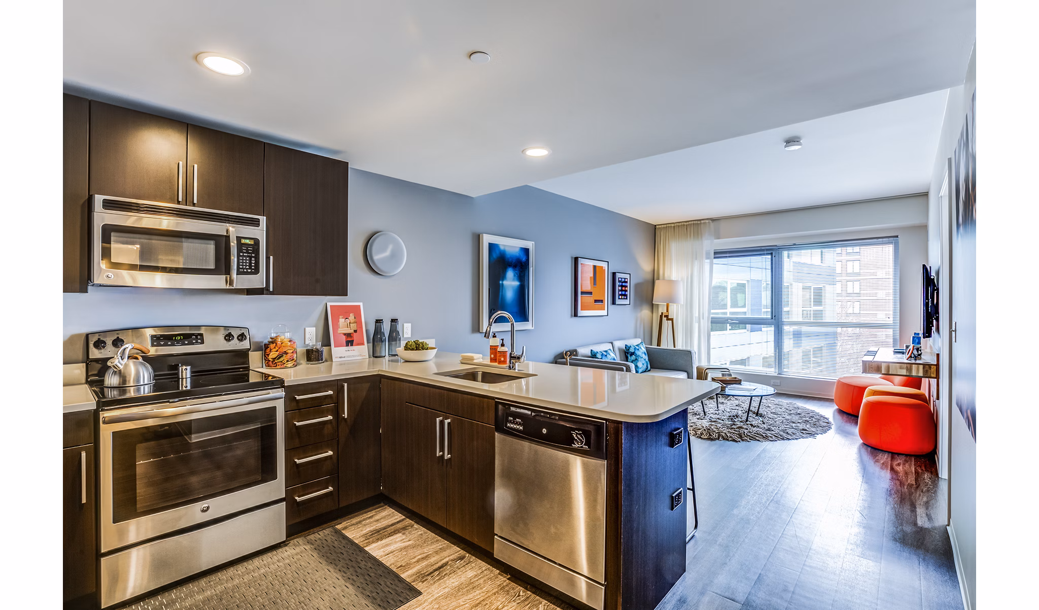 Modern kitchen with stainless steel appliances and sleek cabinetry at Zinc Apartments luxury residences