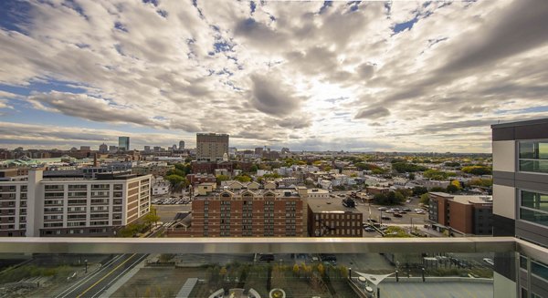 Zinc Apartments: Contemporary design high-rise apartments in vibrant cityscape