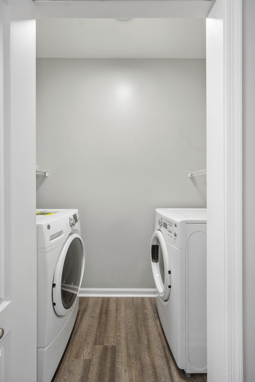 Laundry room at West Village Apartments
