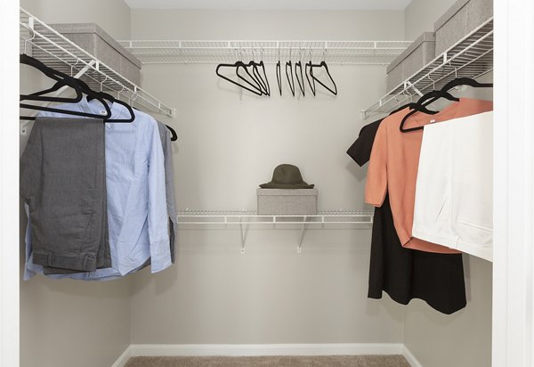 Cozy bedroom with stylish decor at Pembroke Woods Apartments