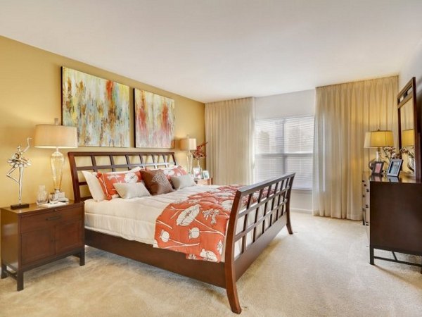 Cozy bedroom with natural light at Pembroke Woods Apartments luxury housing