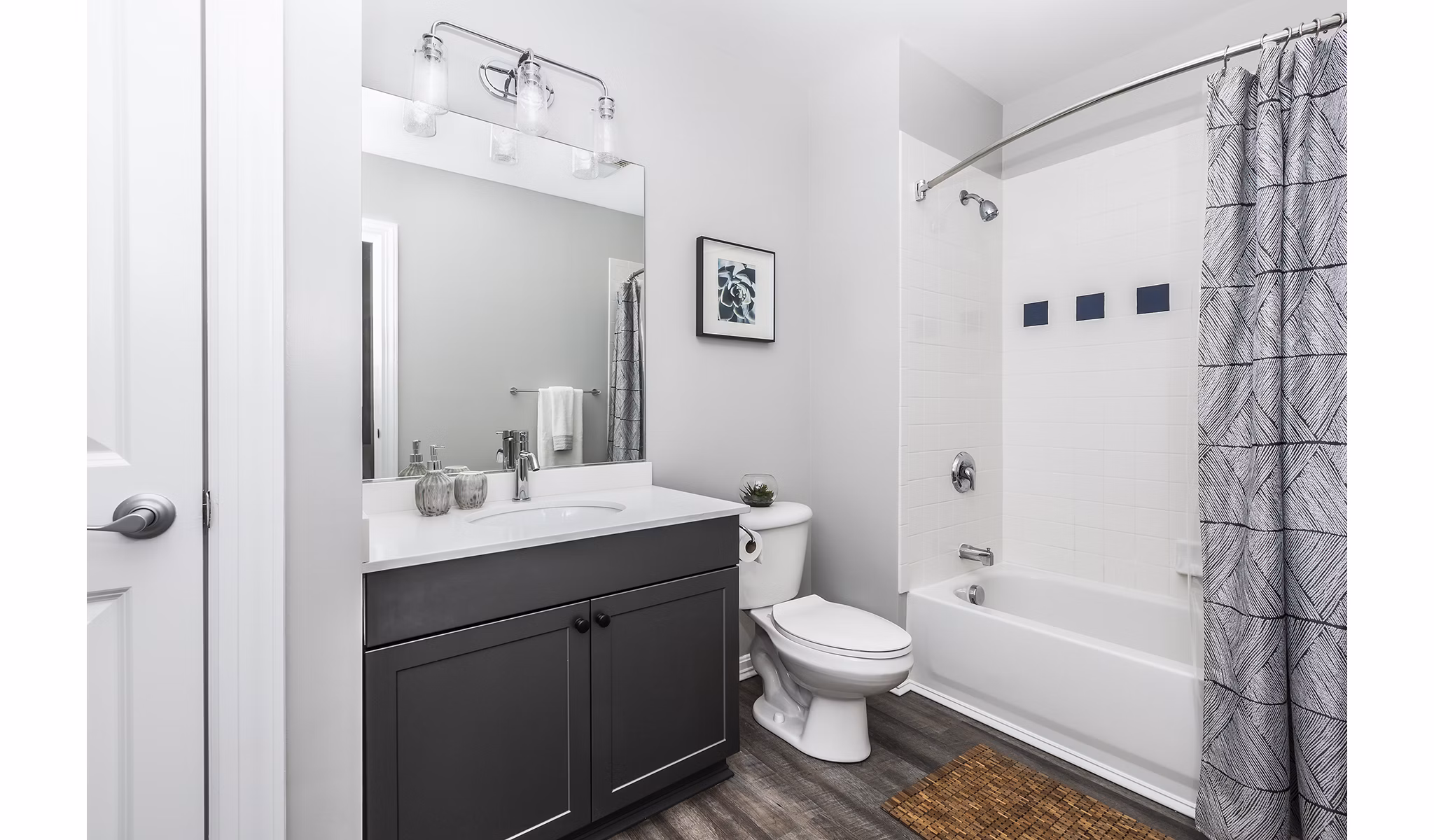 Modern bathroom with elegant fixtures at Pembroke Woods Apartments, offering luxury living and comfort