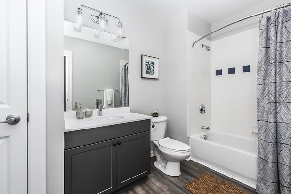 Modern bathroom with elegant fixtures at Pembroke Woods Apartments, offering luxury living and comfort