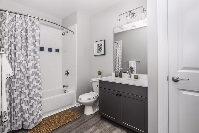 Contemporary bathroom design with quartz countertops at Pembroke Woods Apartments