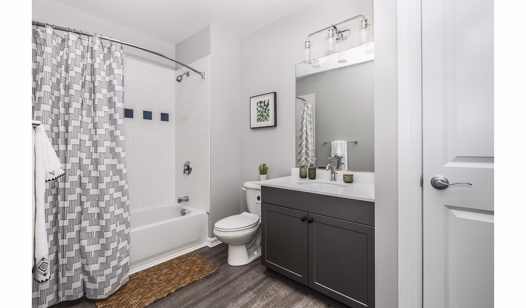 Contemporary bathroom design with quartz countertops at Pembroke Woods Apartments